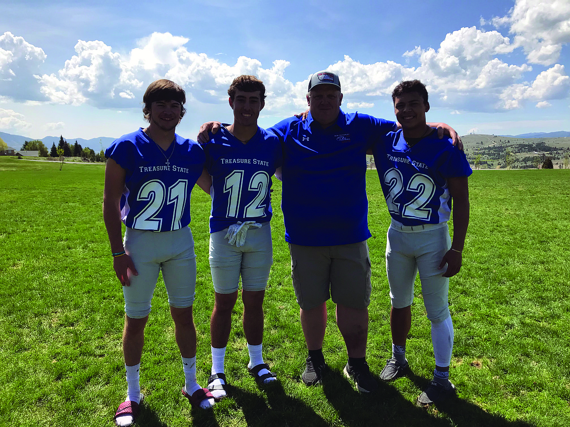 ARLEE HIGH School football coach Chuck Forgey (middle) is pictured with his 8-man Class C 8-man all stars at the 36th annual at the 36th annual Bob Cleverley 8-Man All-Star Game in Butte. (Jason Blasco/Lake County Leader)