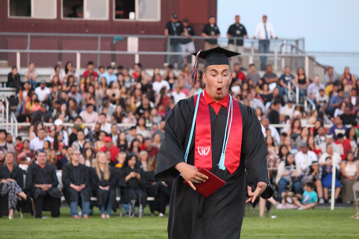 Cheryl Schweizer/Sun Tribune
A student in Othello High School&#146;s class of 2019 is pumped to pick up that diploma.