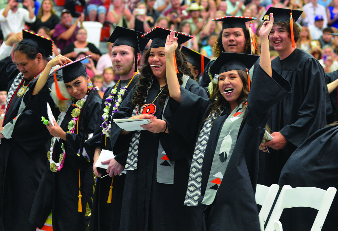 MEMBERS OF the Ronan High School Class of 2019 share a laugh during the graduation ceremony held Sunday, June 2 at the Ronan Event Center. They dressed quite well for the special occasion. (Jason Blasco photos/Lake County Leader)