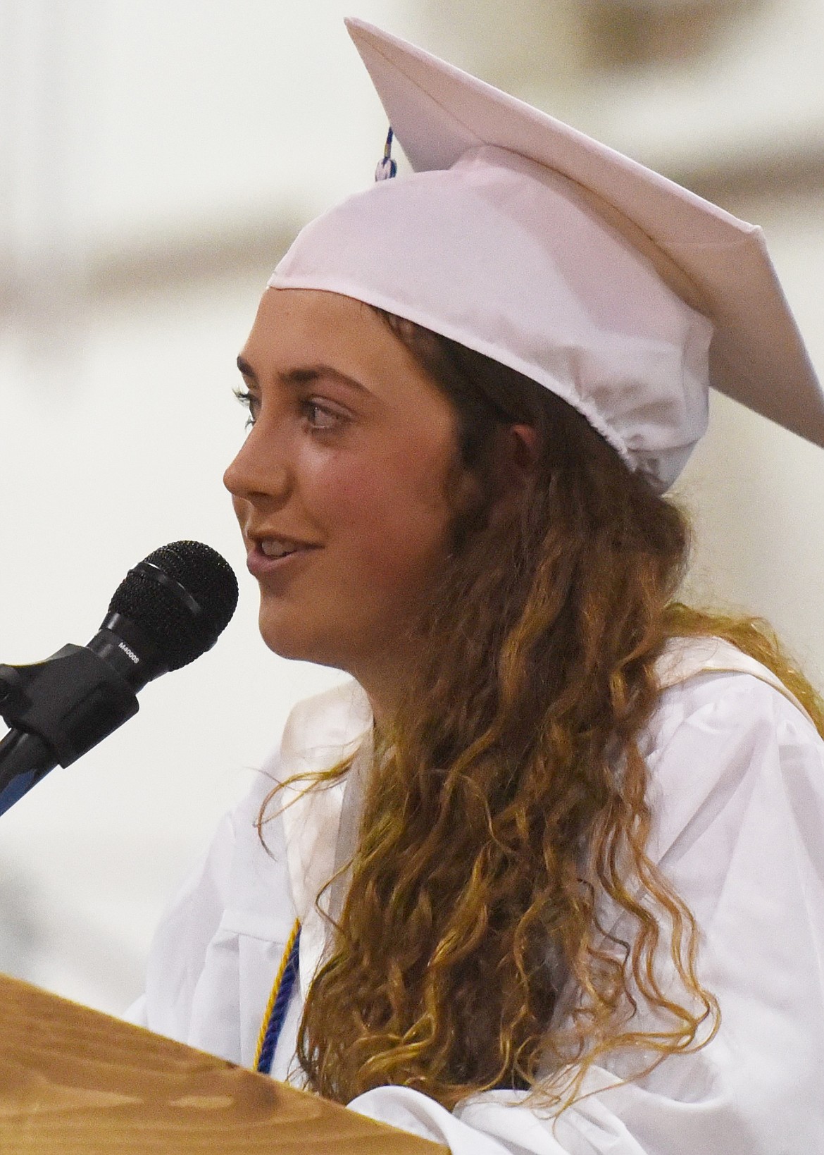 KYLEE WELLS gives her salutatorian address during the St. Ignatius High School graduation ceremony on Saturday, June 1.