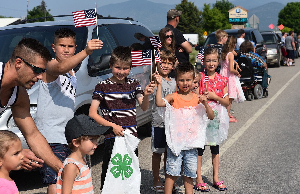 THERE WERE bags aplenty along the Plains Day Parade route on Saturday, June 1. It was first-come, first served on collecting candy.