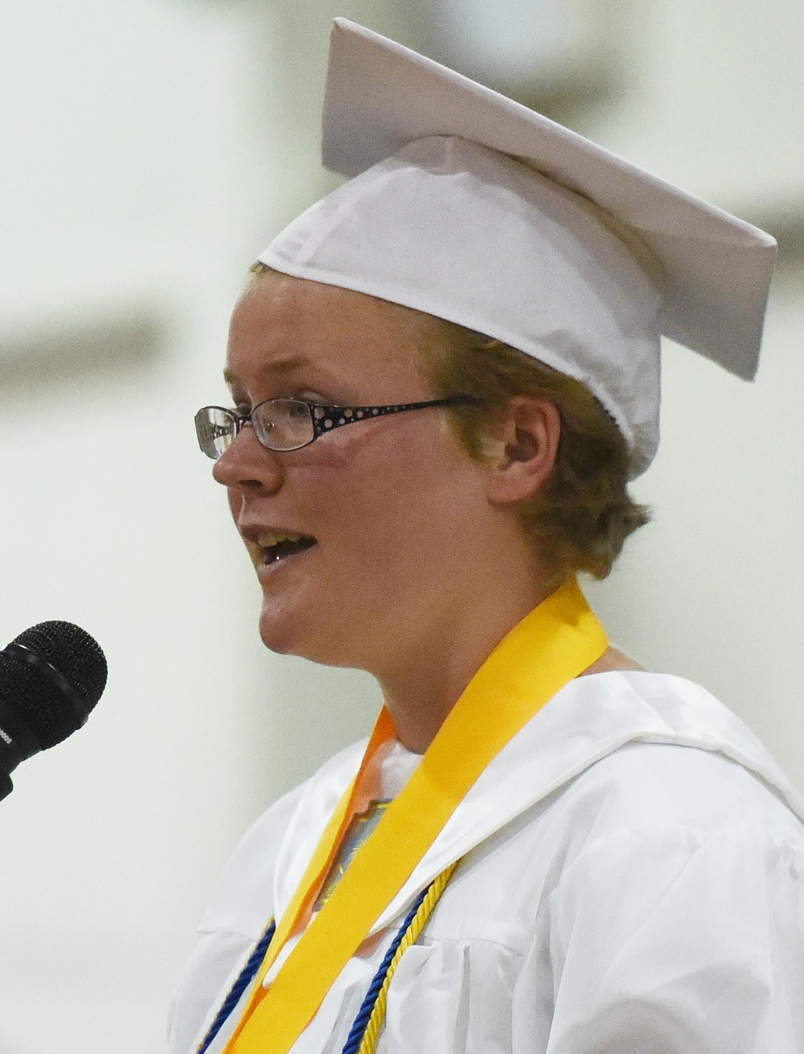 YVONNE BATY gives her valedictorian address during the St. Ignatius High School commencement exercises on Saturday, June 1.