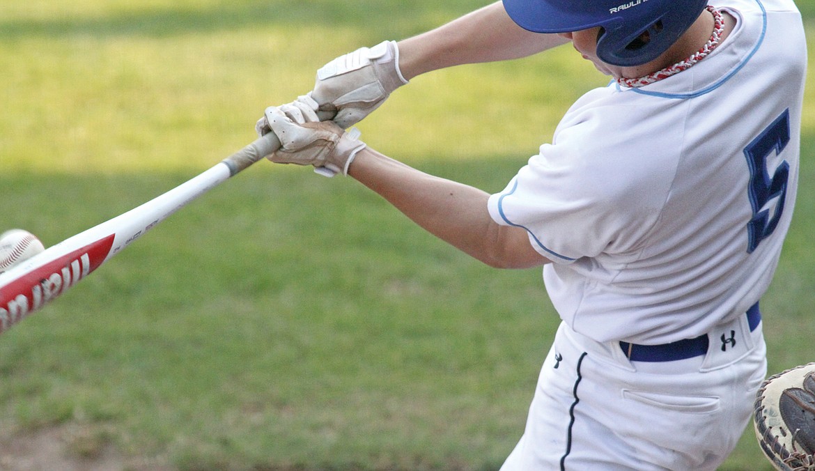 Tripp Zhang smacks a stand-up double on the 3-2 pitch with one out bottom of the fifth inning vs. Glacier Twins B. Loggers over Twins 6-2 Wednesday evening. (Paul Sievers/The Western News)
