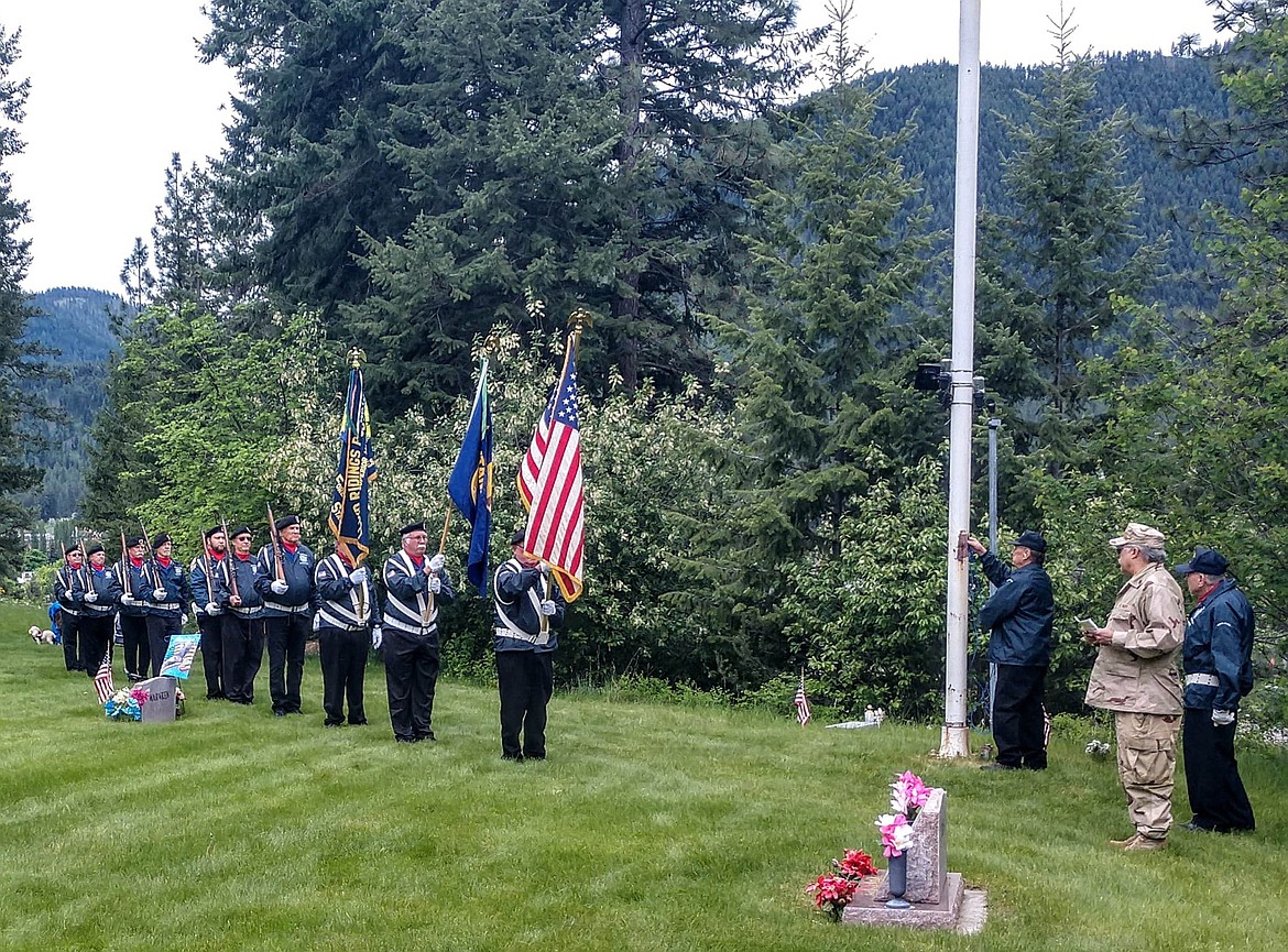 ABOVE: 
VETERANS honor those who died in military service at the Superior Cemetary on Monday, May 27. (Courtesy photo)