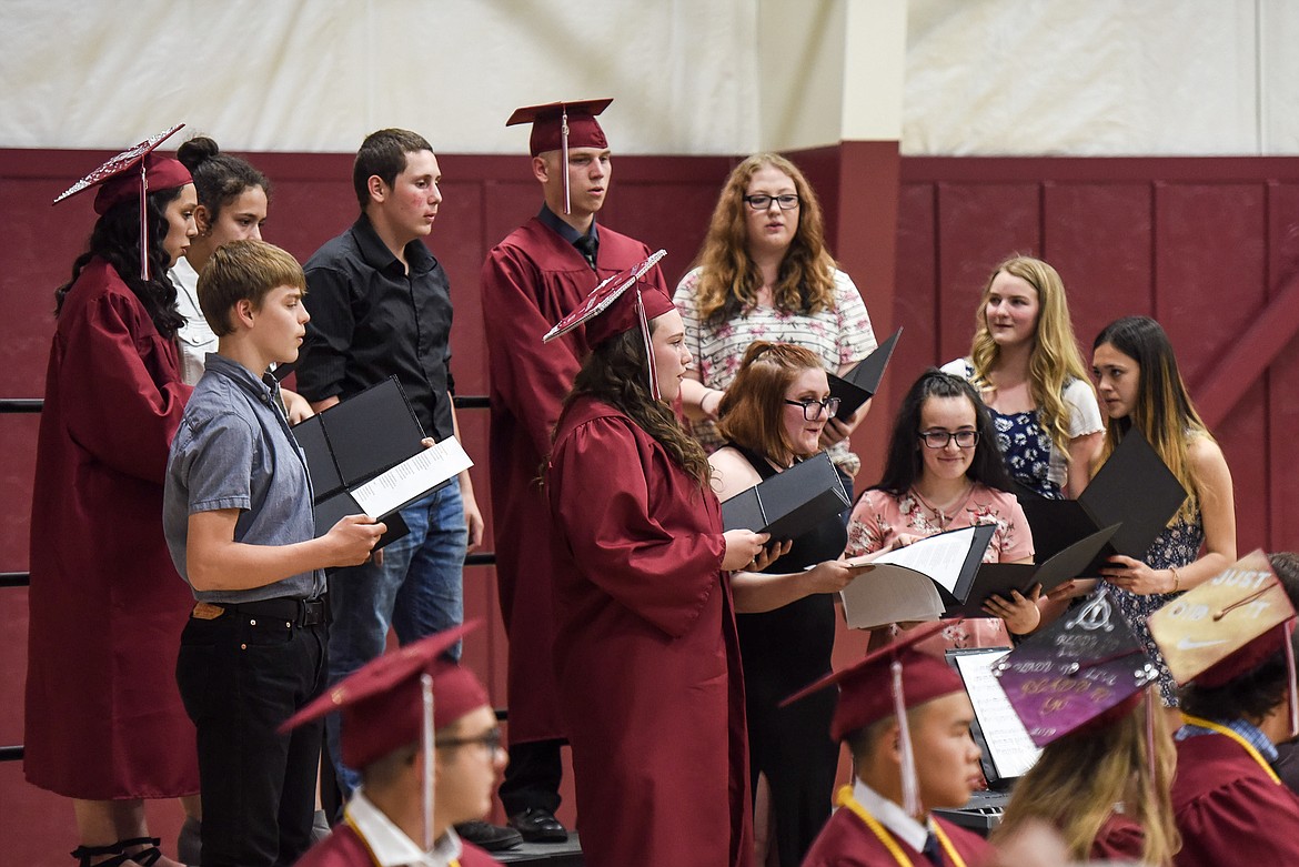 The Troy High School Choir performs &#147;One Voice&#148; Saturday at Troy&#146;s graduation at the Troy Activity Center. (Ben Kibbey/The Western News)