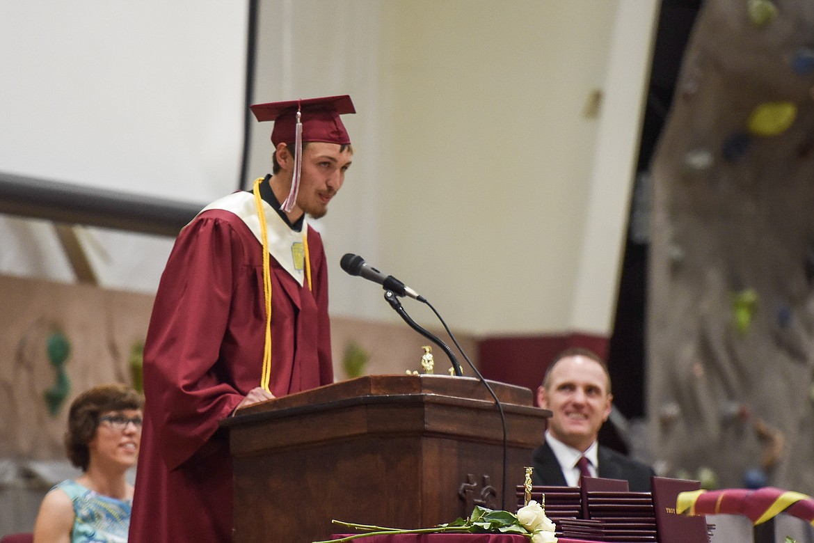 Troy High School valedictorian Dylan Cummings speaks Saturday at Troy&#146;s graduation. (Ben Kibbey/The Western News)