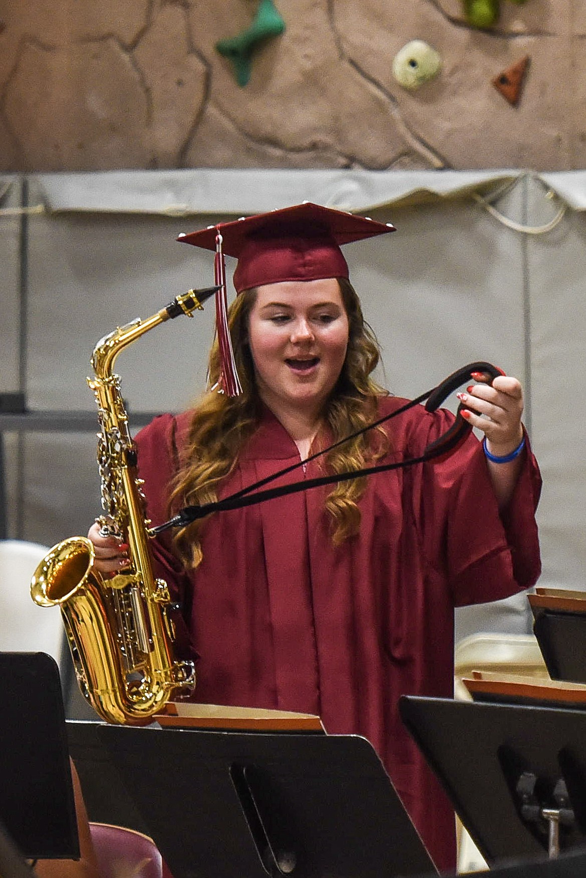 Troy High School&#146;s Tristyn Winebark prepares to join the band in playing &#147;Old Devil Moon,&#148; Saturday at Troy&#146;s graduation. (Ben Kibbey/The Western News