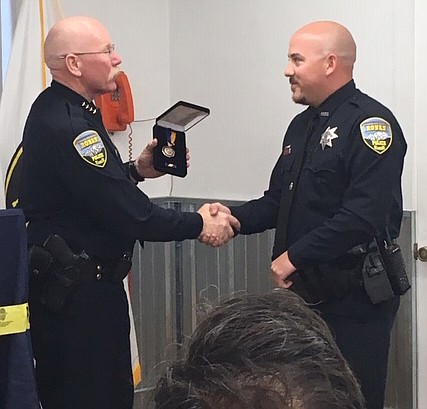 OFFICER COREY White was nominated by his peers and was awarded Officer of the Year for his contributions of building trust in the community. (Photos courtesy of Ronan Police Department)