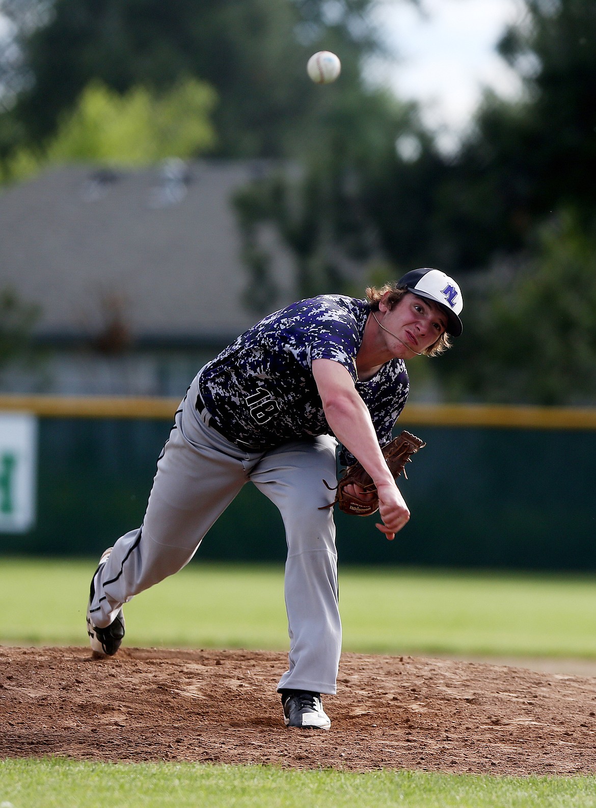 Northern Lakes Mountaineer Cole Strietzel delivers a pitch against the Coeur dAlene Lumbermen.