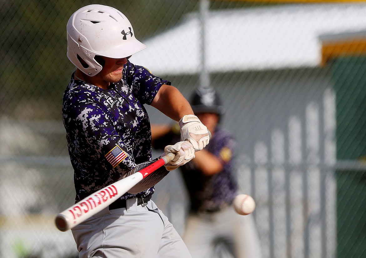 Northern Lakes Mountaineer Alex Drake makes contact on a pitch in a game against the Coeur d&#146;Alene Lumbermen last Monday in Rathdrum. (LOREN BENOIT/Press)