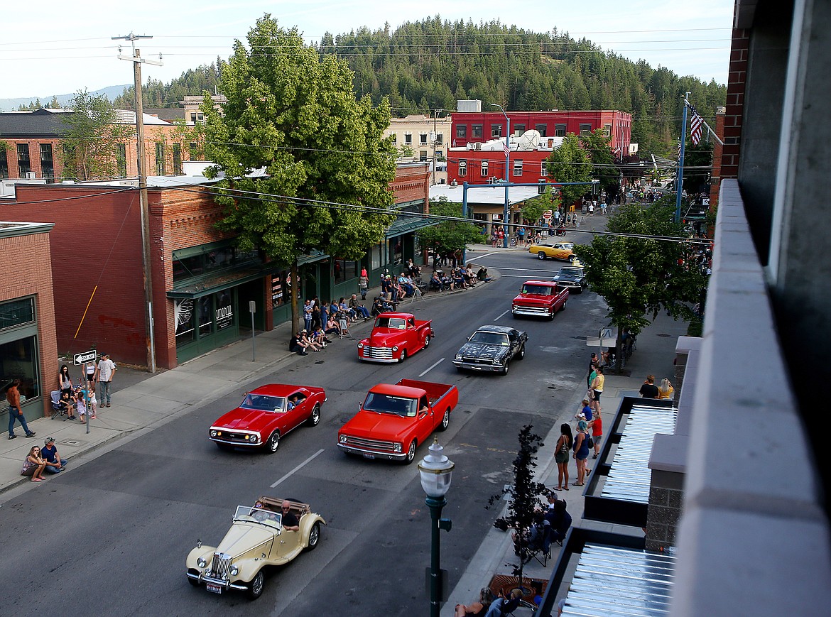 A variety of classic cars make their way up fourth street during Friday night's Car d'Lane cruise. (LOREN BENOIT/Press)