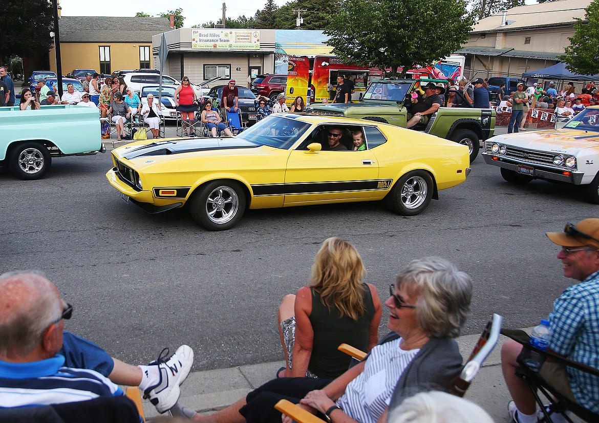 Travis Shands, of Hayden, revs his 1973 Ford Mustang Mach 1 car during Friday night's Car d'Lane Cruise. (LOREN BENOIT/Press)