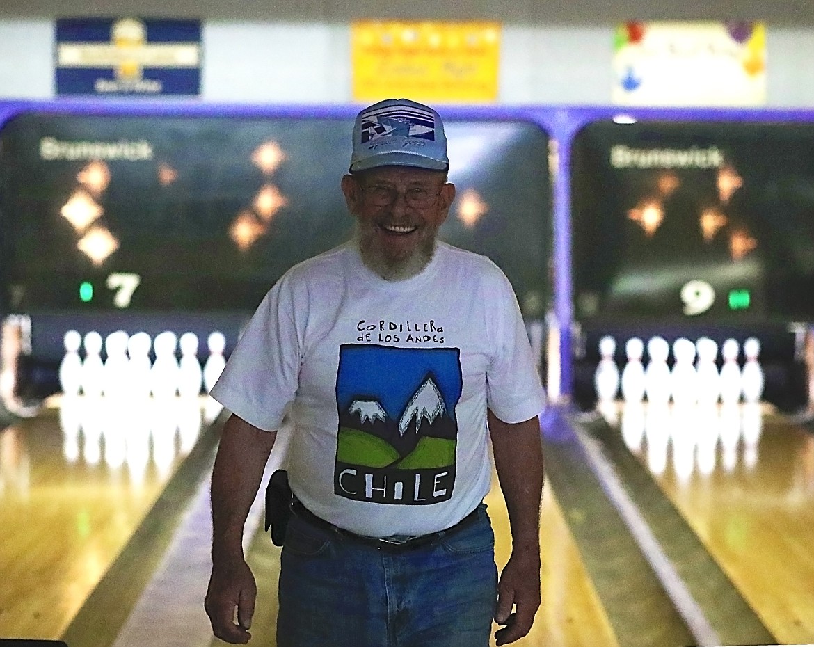 (Photo by KYLE CAJERO)
Fred Meyer grins after rolling a strike in the tenth frame on June 14.