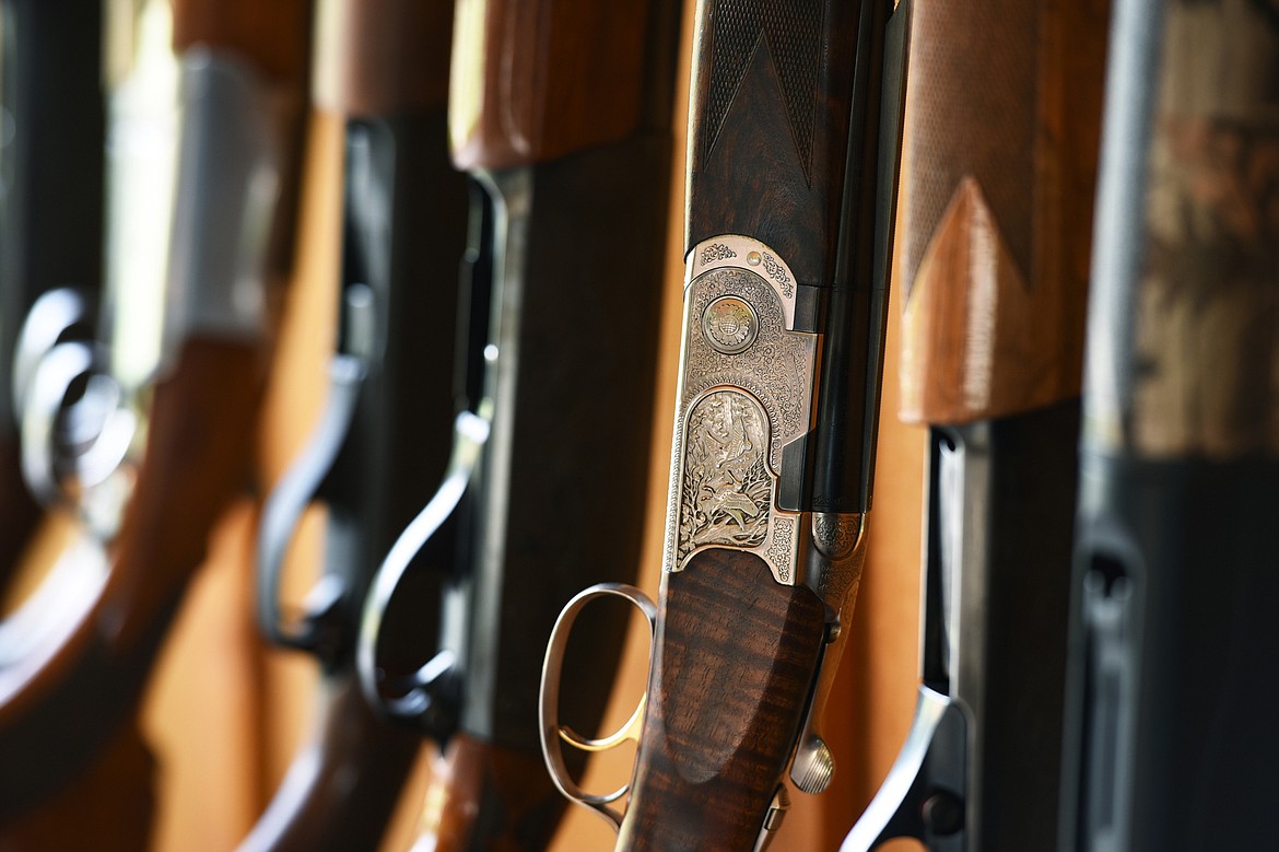 Shotguns are stored in a rack during an outing at the Bigfork Gun Club in this May 21, 2019, file photo. (Casey Kreider/Daily Inter Lake)
