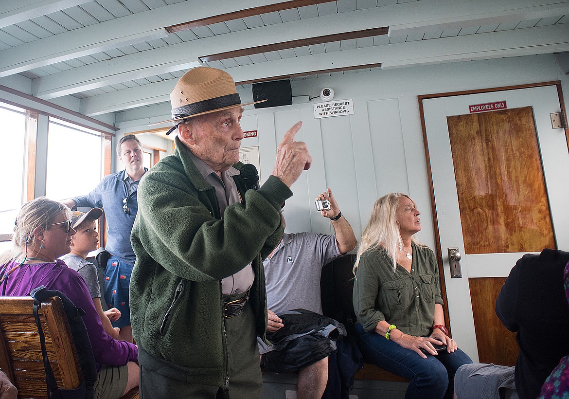 Doug Follett tells a tale during a DeSmet boat tour last week.