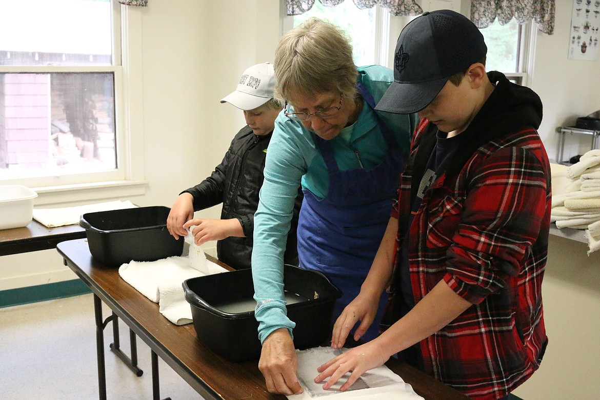 (Photo by MARY MALONE) 
Idaho Hill Elementary sixth graders learned how to make paper during the Priest Community Forest Connection&#146;s annual Forest Expo on May 24 at the Priest River Experiemental Forest.