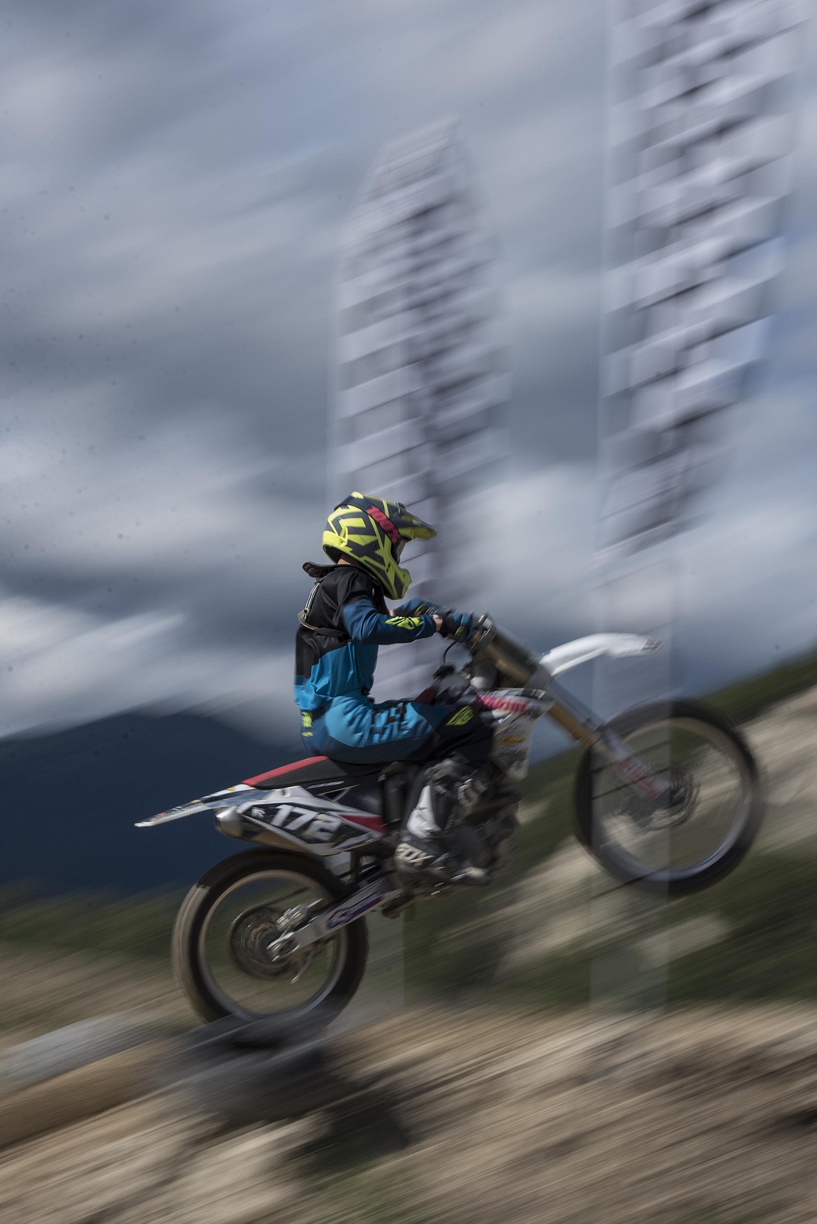 A racer finishes a lap while competing in the 250cc section of the Millpond Motocross race, Saturday in Libby. (Luke Hollister/The Western News)