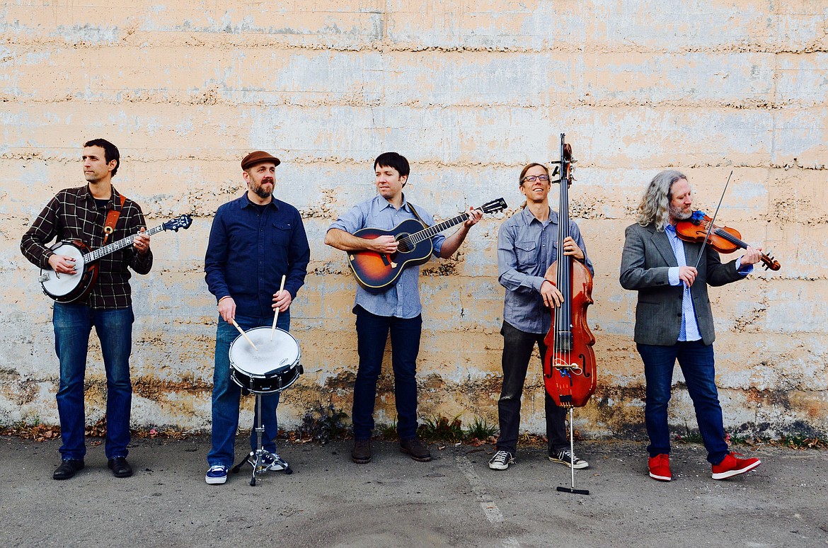 Hot Buttered Rum band from left, Erik Yates (banjo, guitar, woodwinds and vocals, James Stratford (drums and percussion), Nat Keefe (guitar and vocals), Bryan Horne (double bass and vocals) and Zebulon Bowles (fiddle and vocals). (Photo Matt Sharkey)