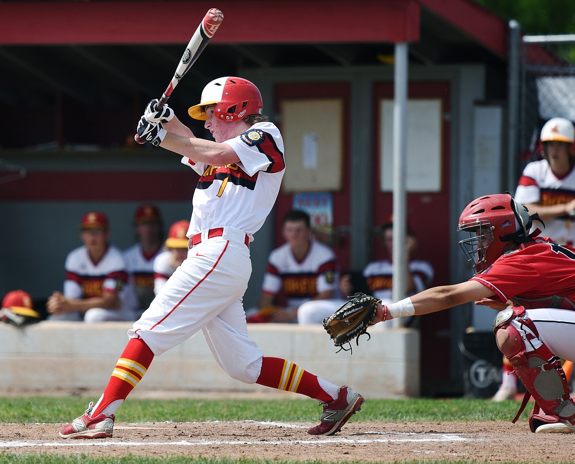 Kalispell's Ben Corriveau rips an RBI single in the Lakers A's 12-run second inning against Cranbrook Bandits A at Griffin Field on Wednesday. (Casey Kreider/Daily Inter Lake)