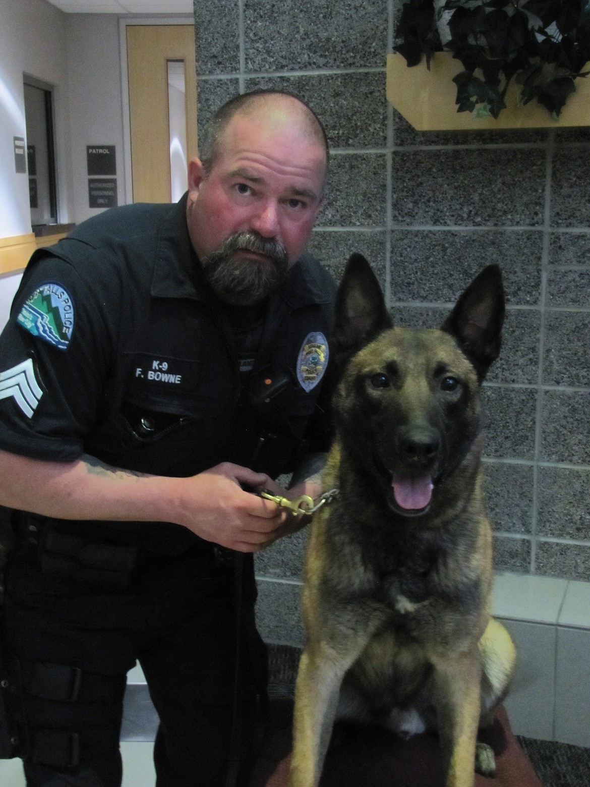 Post Falls Police Sgt. Frank Bowne poses with Duco, a five-year-old Belgian Malinois and valued member of PFPD since 2015.