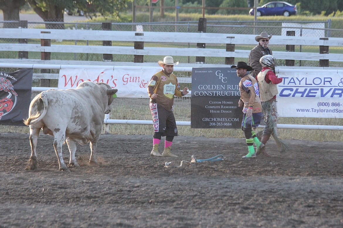 Photo by TANNA YEOUMANS
The rodeo clowns put themselves between the bull and the cowboy.