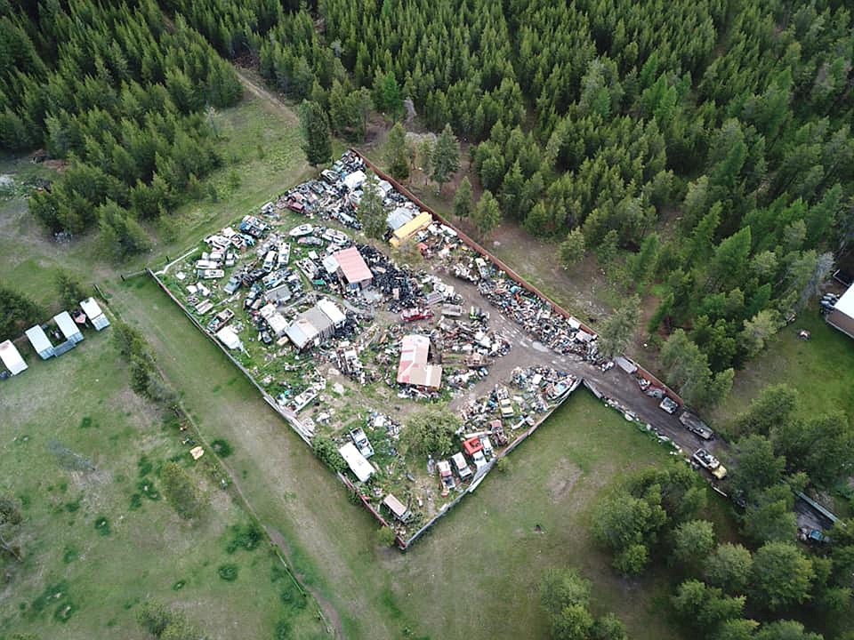 Large amounts of debris, old tires and more than 100 junk vehicles are being removed from Michael Linstead&#146;s property in Marion through a collaborative effort involved numerous Flathead County departments and the state Department of Environmental Quality. (Photo courtesy Flathead OES)