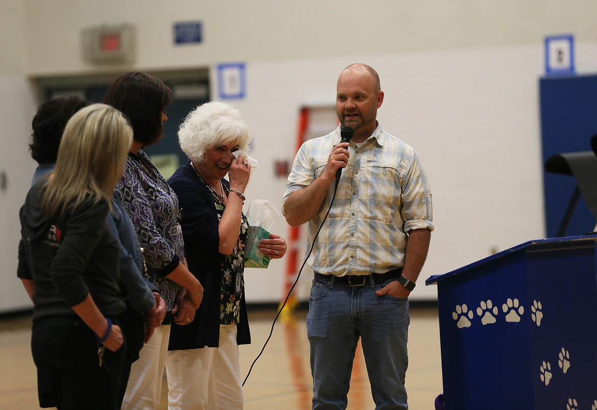 DEVIN WEEKS/Press
Ponderosa Elementary Principal Scott Ross says a few words honoring the school&#146;s retirees as first-grade teacher Paula Hearn dabs her eyes during a recognition ceremony Thursday morning on the last day of school. Also pictured, from left: secretary Tammy Kane, second-grade teacher Sharon Wagner and third-grade teacher Anne Bryan.