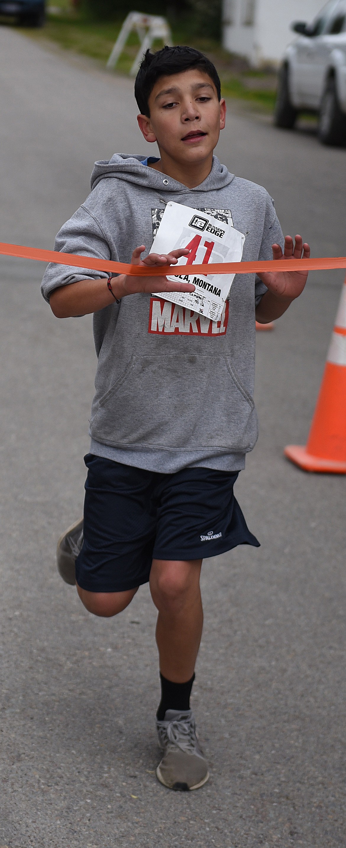 ELIJAH CAMPBELL, only 12 years old, of Hot Springs was the overall winner of the 3K portion of the Skunk Alley Fun Run. His winning time was 13 minutes, 20 seconds. Dita Bras was the first female to finish the 3K.