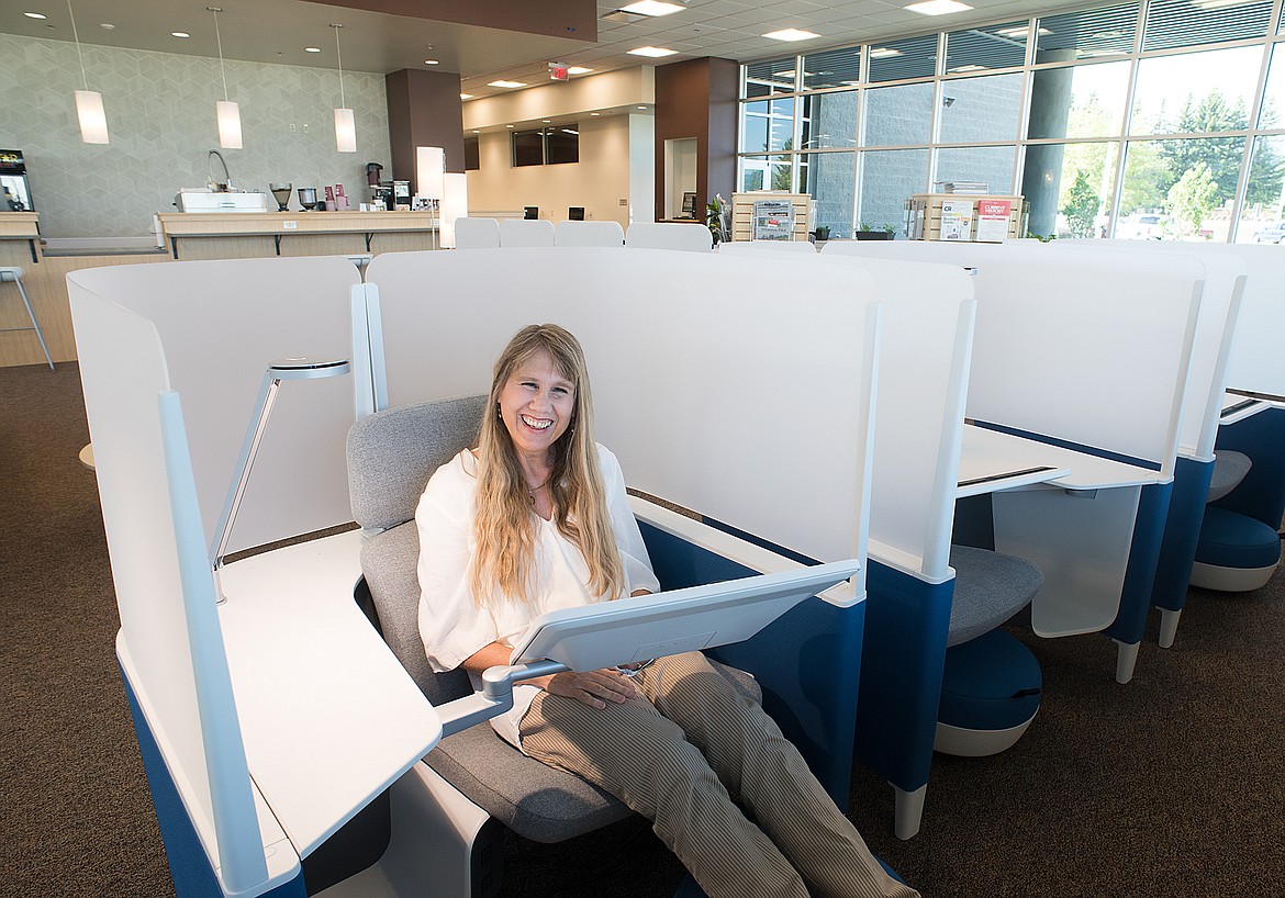 FVCC  librarian Susan Matter shows off one of the new &quot;brody&quot; chairs at the library last week.