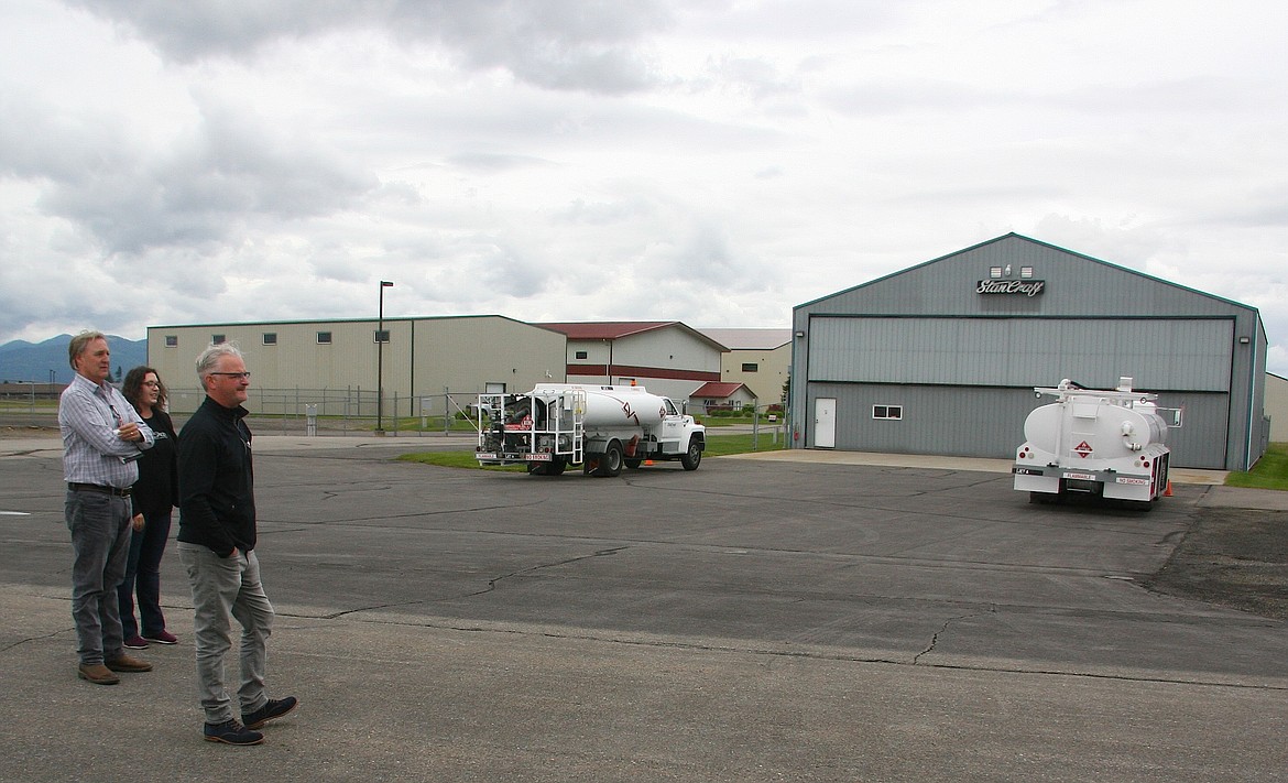 From left, Wally Jacobson, executive director of Panhandle Area Council, Jolene Compton, general manager of StanCraft Jet Center, and Robb Bloem,  StanCraft owner, survey the Coeur d&#146;Alene Airport on Thursday. They are shown at the fueling center that StanCraft purchased from Southfield Aviation. (BRIAN WALKER/Press)