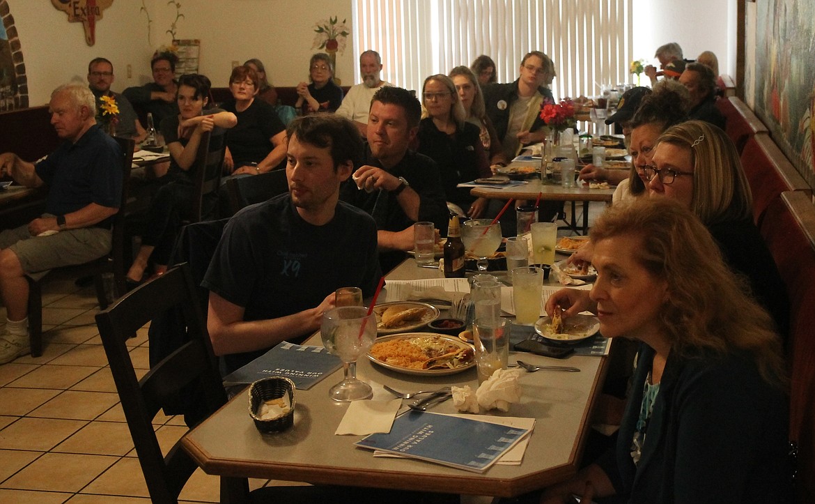 CRAIG NORTHRUP/Press
Local Democrats listen at Las Chevalas as their party&#146;s candidates argue over health care during Thursday night&#146;s debate.