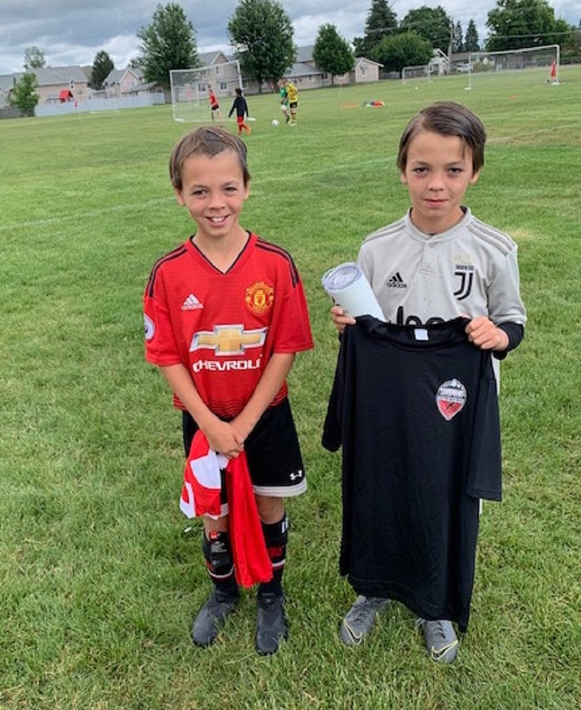 (Photo courtesy of RICK MULLINS)
Jasey and Jack Treman pose after winning the Sandpoint Strikers Summer School&#146;s Sandpoint Super Drug Camper of the Day awards on June 20.