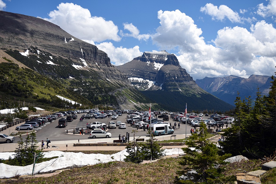 View of the Logan Pass parking lot full of visitors in Glacier National Park on Wednesday. (Casey Kreider/Daily Inter Lake)