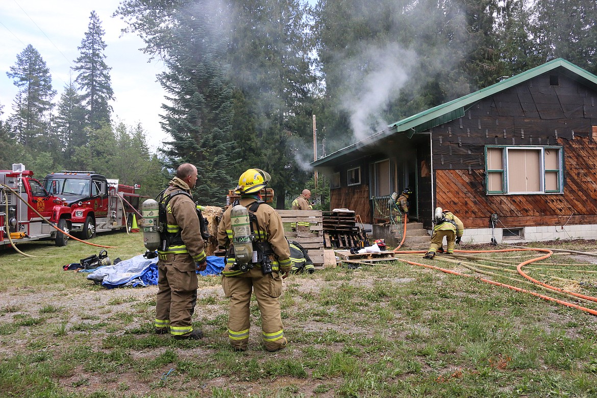 Photo by MANDI BATEMAN
The South Boundary Fire Protection District teamed up with the Northside Fire District of Bonner County for a live burn on Saturday, June 22.