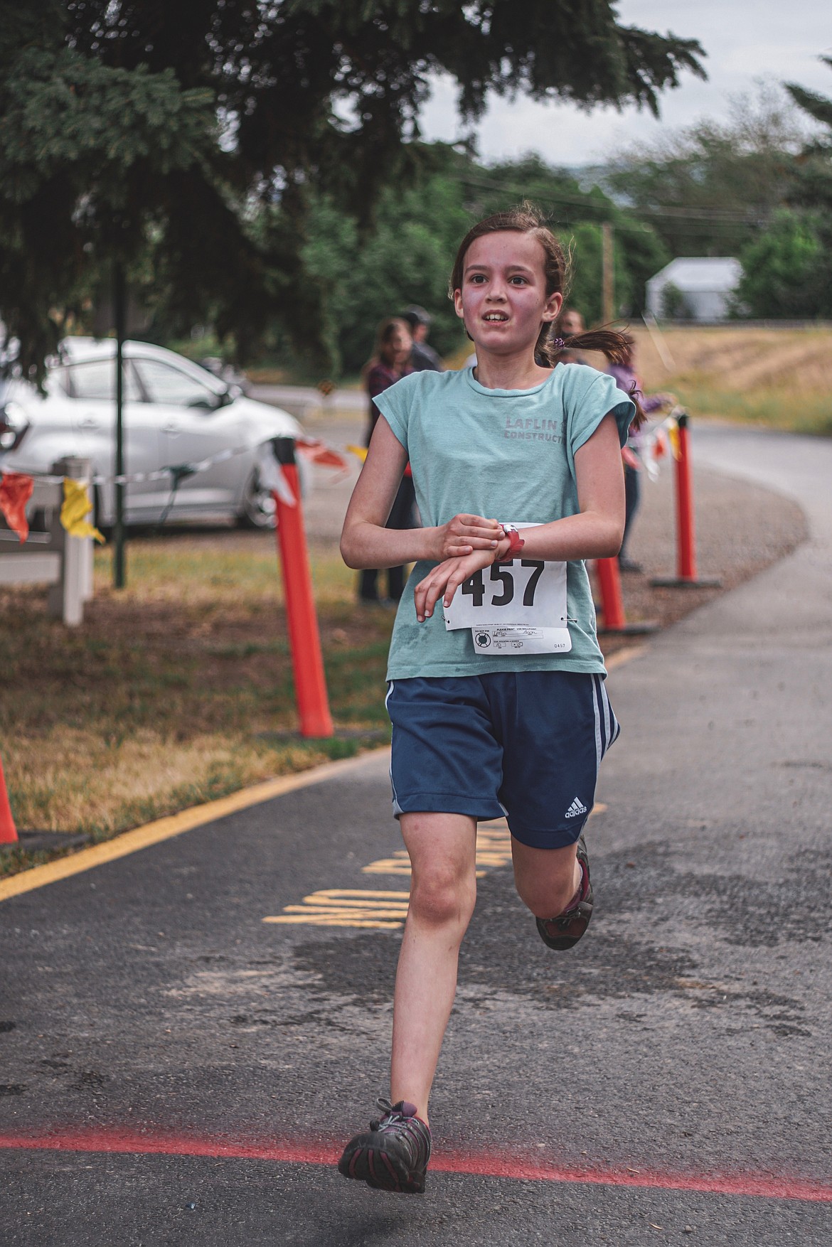 Photo by LEVI BONNELL
Anna Laflin bearing down on the finish line where she came in third place in the 5K Women&#146;s 0-11 Age Group.