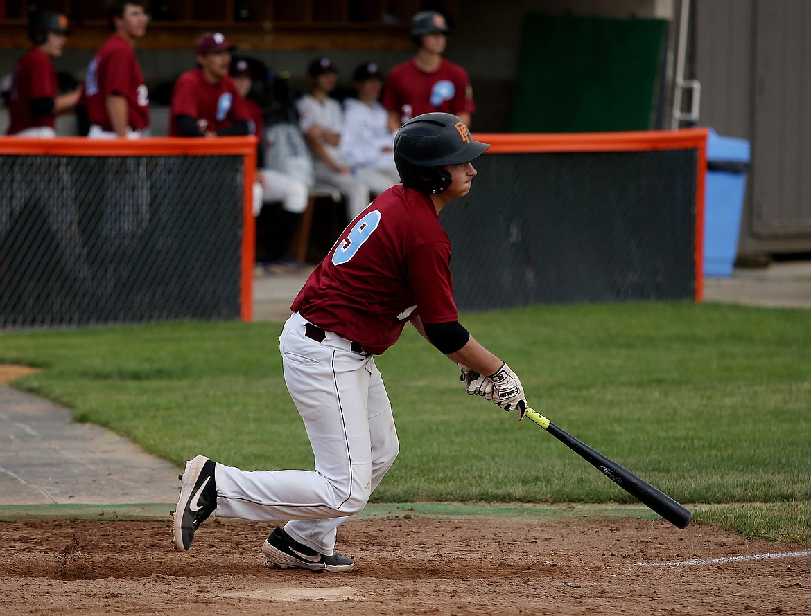 Prairie Cardinal Andrew Davidson makes contact on a ball in a game against the Northwest Blaze Thursday at Post Falls High School. (LOREN BENOIT/Press)