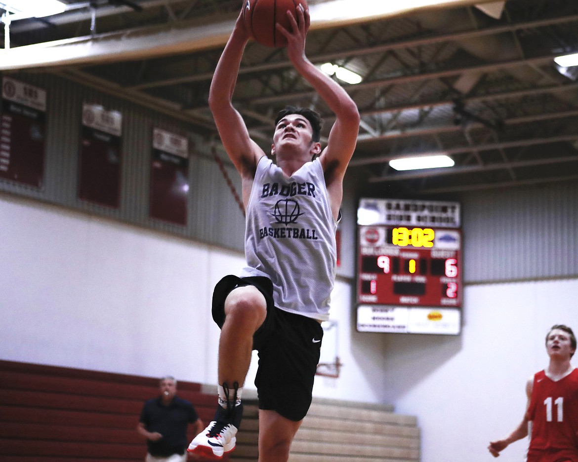 (Photo by KYLE CAJERO)
Incoming Bonners Ferry freshman Braeden Blackmore rises for a dunk during a scrimmage against Sandpoint on June 18.