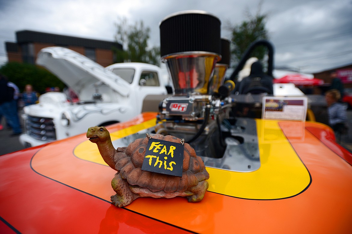 A turtle figurine rests atop a 1950 Willy's Pro Street Jeep with 900 horsepower and nitrous owned by Christy and Larry Novak, of Kalispell, at The Big Shindig outside The DeSoto Grill in Kalispell on Saturday. The Big Shindig features a wide range of classic, custom and unfinished cars as well as live music, barbeque, beer and a pin-up polar plunge. (Casey Kreider/Daily Inter Lake)