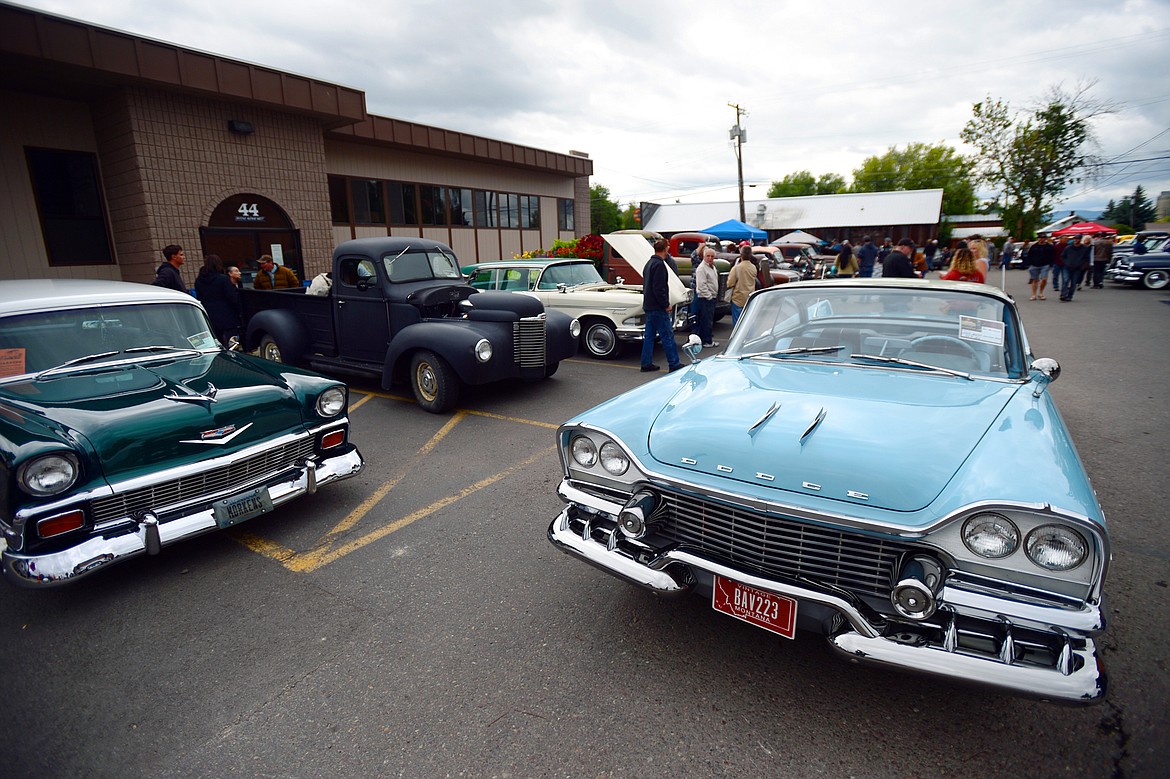 Classic and custom cars line up at The Big Shindig outside The DeSoto Grill in Kalispell on Saturday. The Big Shindig features a wide range of  cars as well as live music, barbeque, beer and a pin-up polar plunge. (Casey Kreider/Daily Inter Lake)