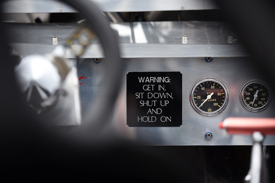 A sign on the dashboard inside a 1950 Willy's Pro Street Jeep with 900 horsepower and nitrous owned by Christy and Larry Novak, of Kalispell, at The Big Shindig outside The DeSoto Grill in Kalispell on Saturday. The Big Shindig features a wide range of classic, custom and unfinished cars as well as live music, barbeque, beer and a pin-up polar plunge. (Casey Kreider/Daily Inter Lake)