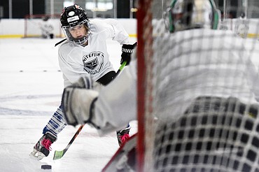 Dean Peterson, of Helena, readies his shot during a breakaway drill at L.A. Kings Summer Camp-Whitefish at Stumptown Ice Den in Whitefish on Thursday. (Casey Kreider/Daily Inter Lake)