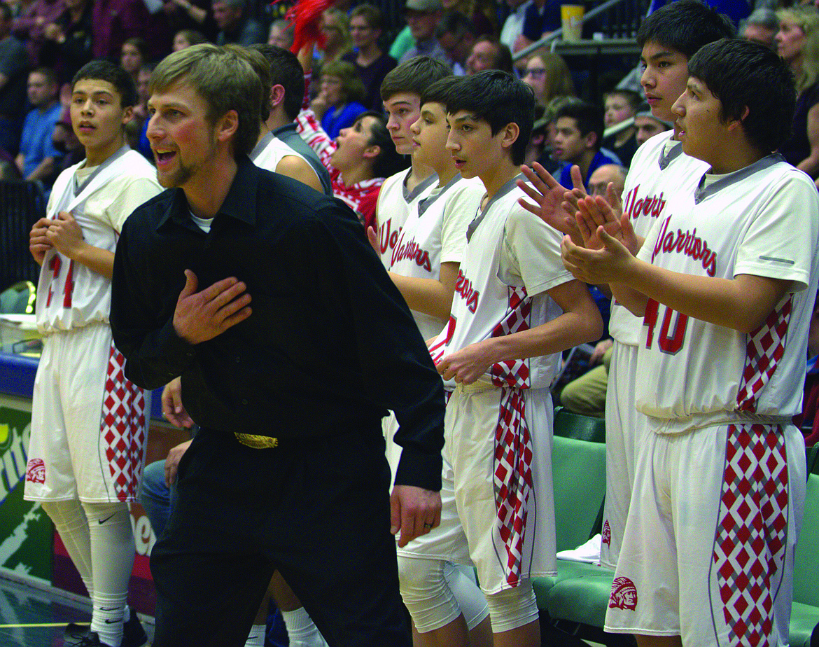 FORMER ARLEE High School coach Zanen Pitts celebrates after his team won its second consecutive Montana High School Association state championship over Manhattan Christian at the Butte Civic Center. (Jason Blasco/Lake County Leader)