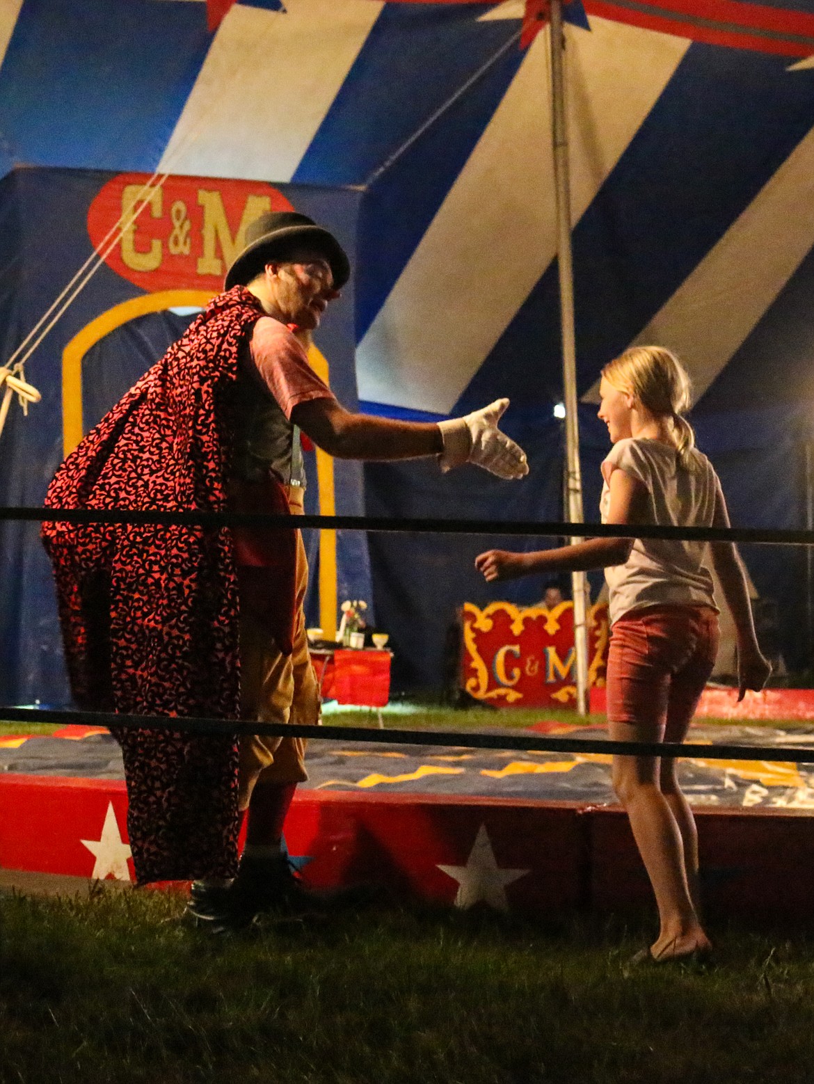 Photo by MANDI BATEMAN
One lucky girl was chosen to go in the arena and perform with Leo the Clown.