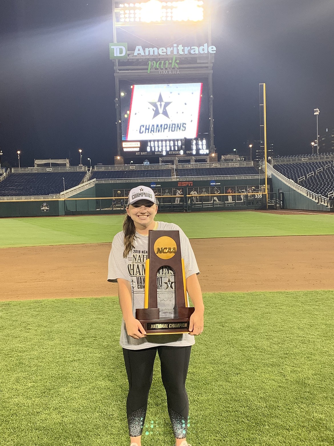 Courtesy photo
Casey Stangel, an administrative assistant with the Vanderbilt baseball team and a former Lake City High softball star, poses with the national championship trophy after the Commodores won the College World Series on Wednesday in Omaha, Neb.