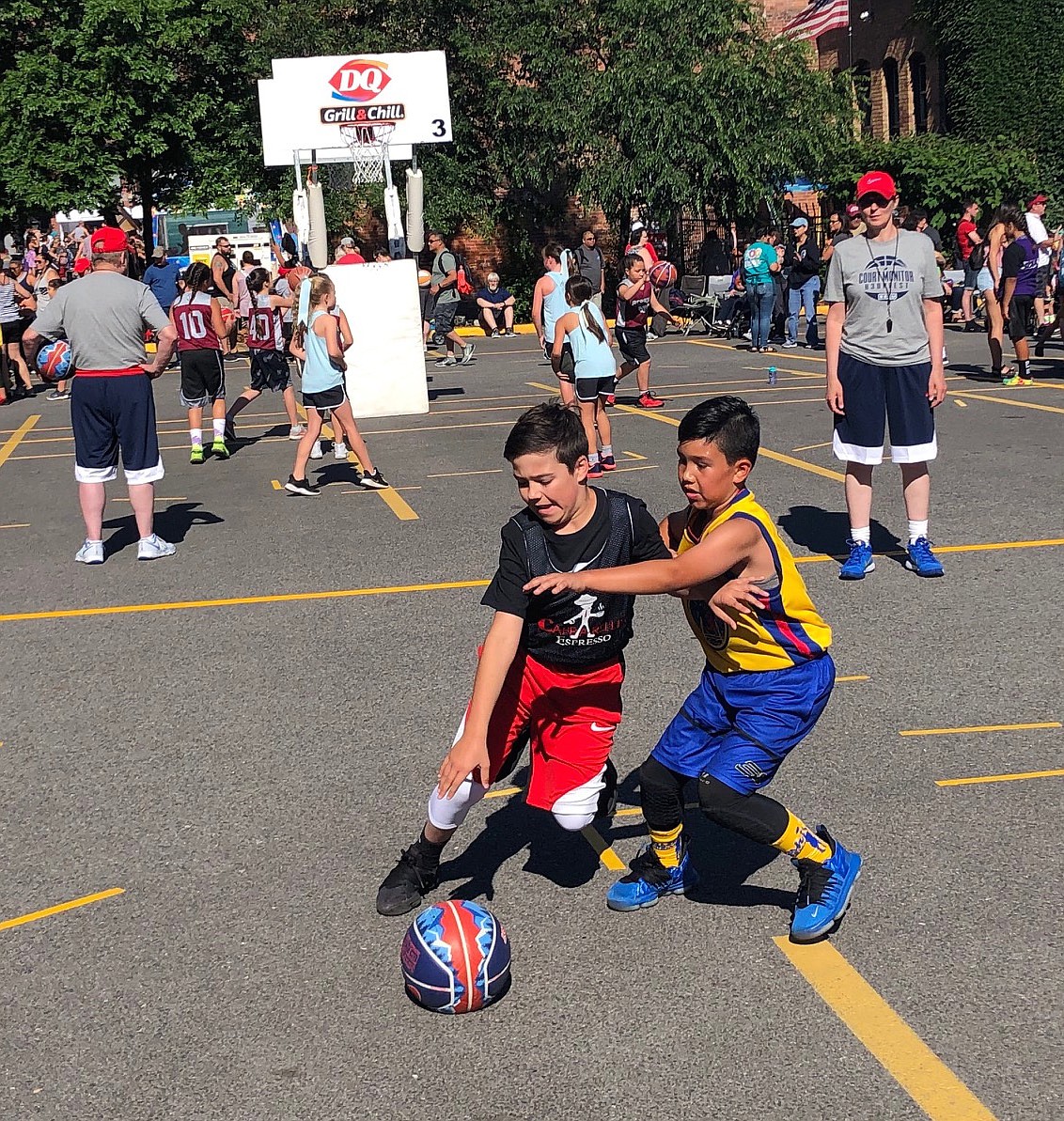 JASON ELLIOTT/Press
Hank Larson of Capparelli Espresso drives to the basket in an opening round game against Dream Team DJMB in a Youth Male Division game at Hoopfest on Saturday.