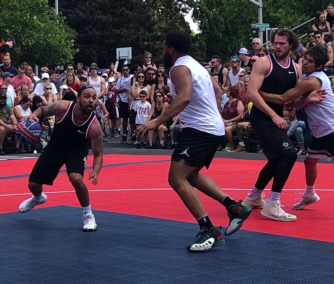 JASON ELLIOTT/Press
Marcus Colbert, a Post Falls High product who played at Montana State and then professionally in Belgium, drives to the basket during a game for RNU Alumni in the men&#146;s Elite Division of Hoopfest at Nike Center Court on Saturday.