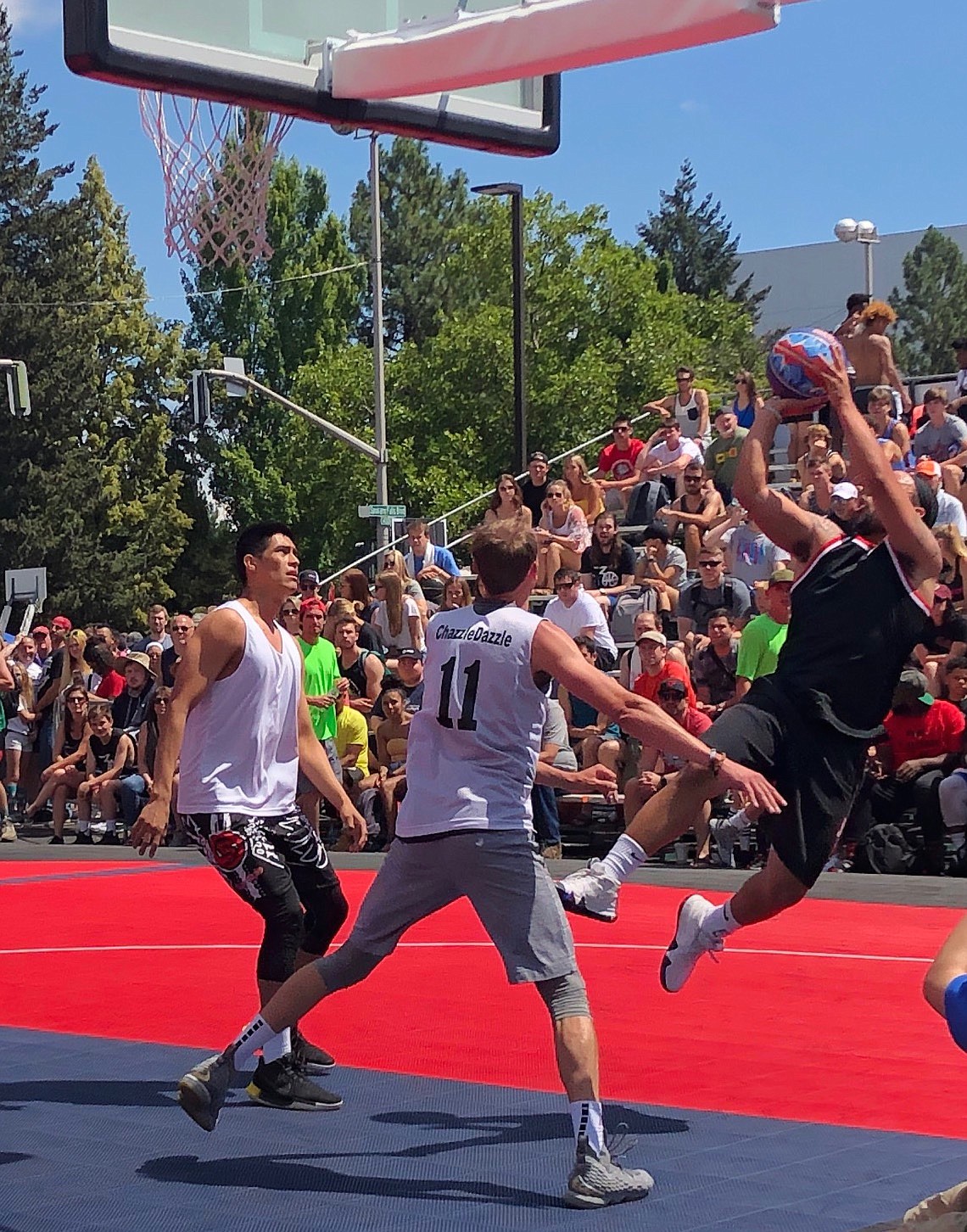 JASON ELLIOTT/Press
Marcus Colbert, a Post Falls High product who played at Montana State, attempts a fallaway jumper during a game for RNU Alumni in the men's Elite Division of Hoopfest at Nike Center Court on Saturday.