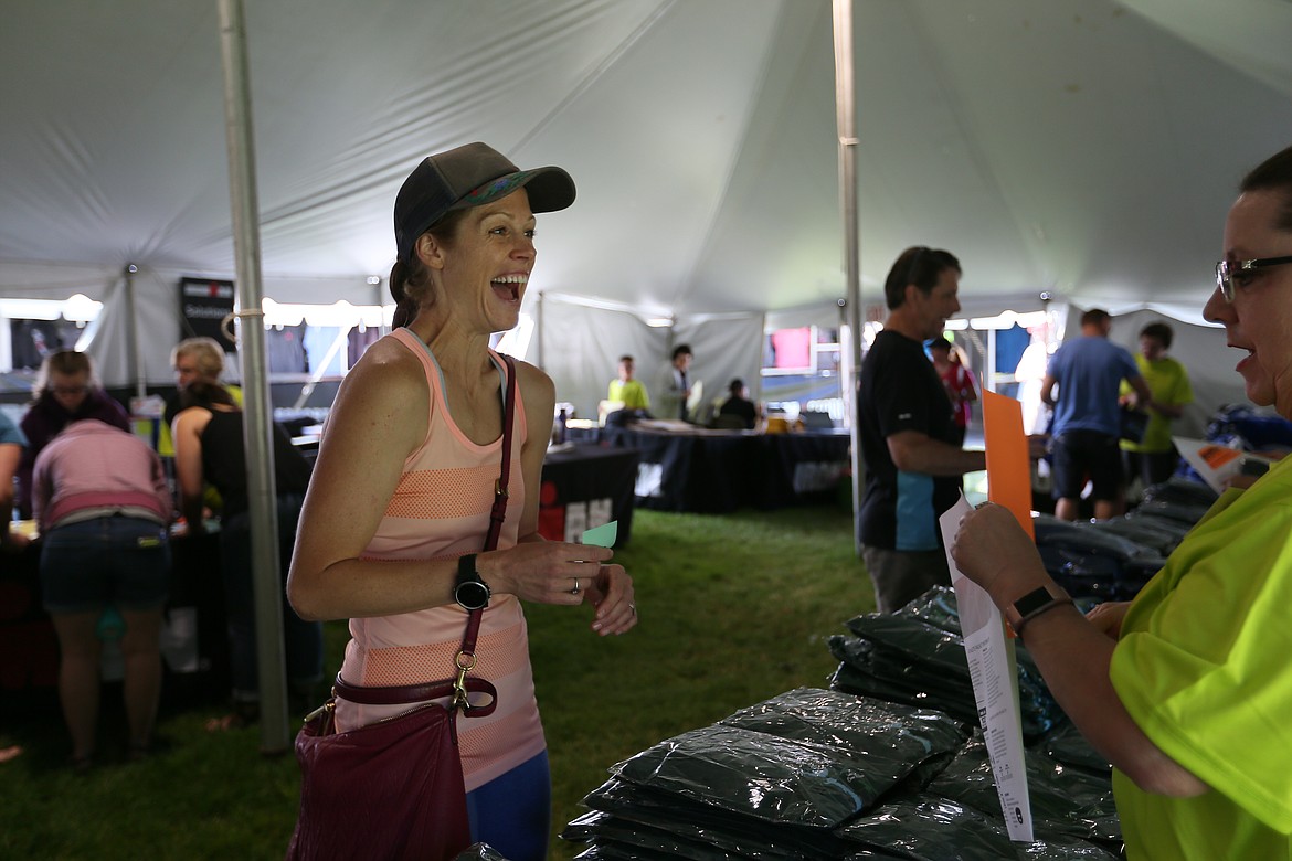 Jessica Swihart, checking-in for her first Ironman on Saturday, said she is nervous and excited about today's race. (JULIA BENNETT/Press)