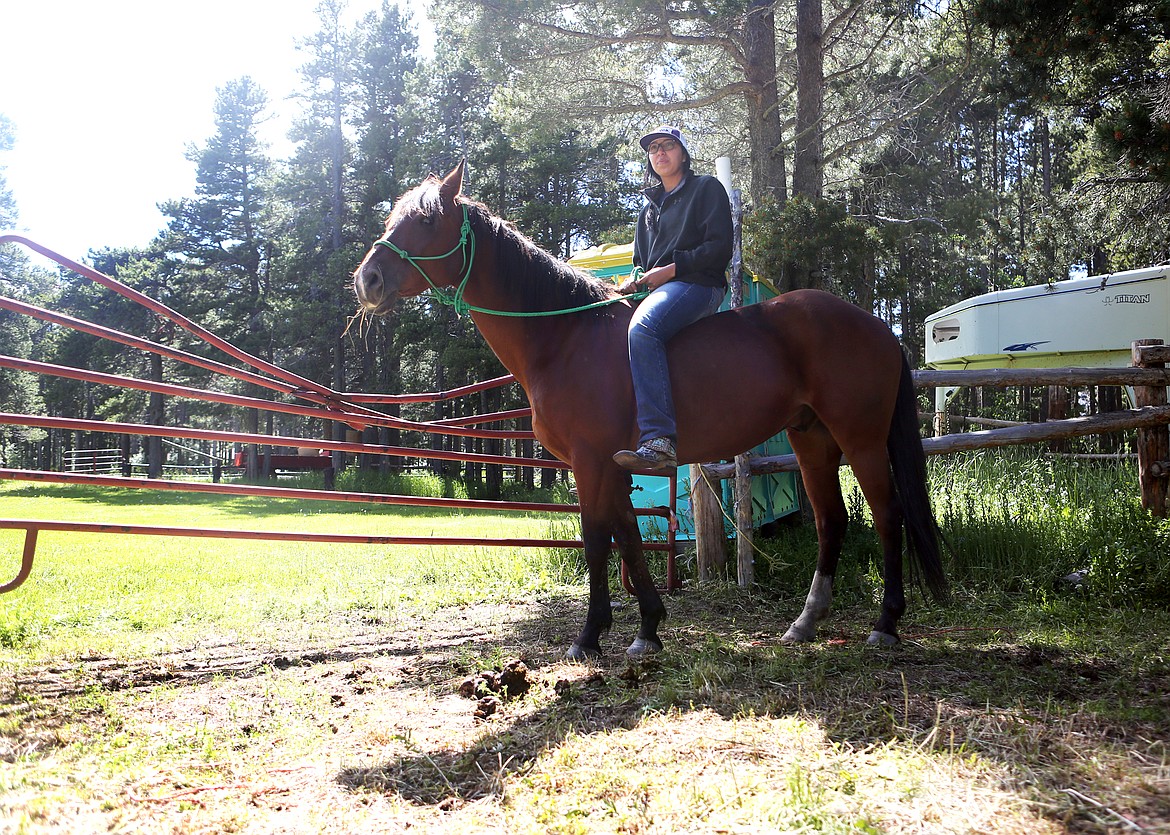 Shaylea Tatsey, 25, rides Houdini at Glacier Gateway Trailrides in East Glacier Park on Monday, June 24. (Mackenzie Reiss/Daily Inter Lake)