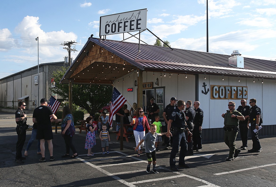 LOREN BENOIT/Press
Citizens meet with local law enforcement at Anchored Coffee to talk about safety over the July Fourth holiday.